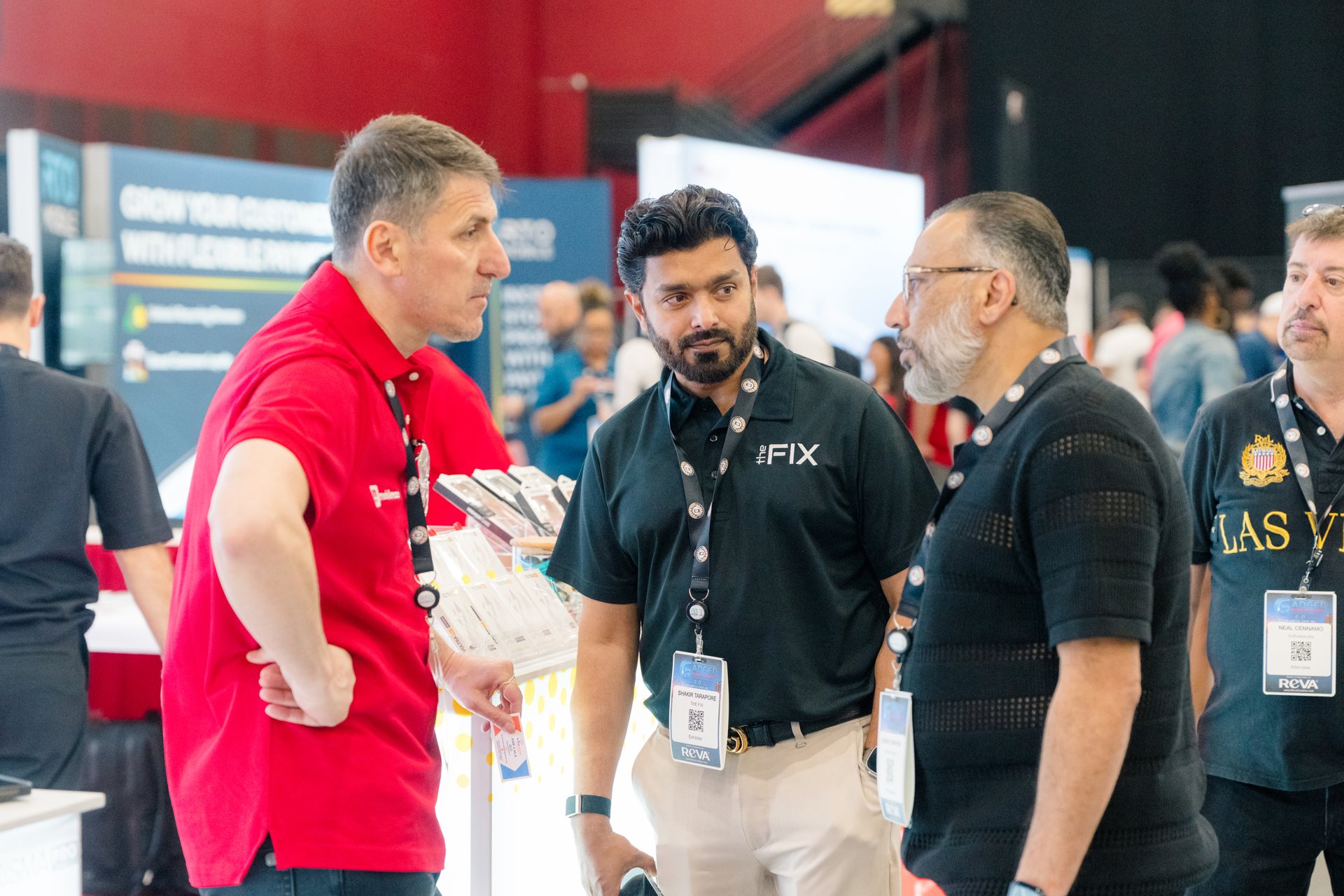 Attendees networking on the expo floor