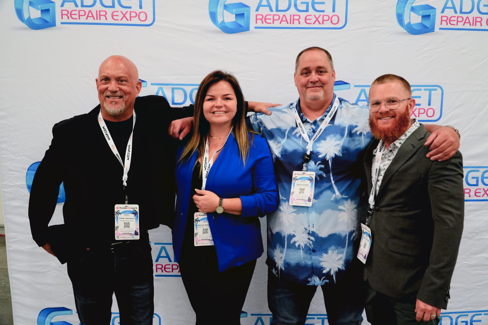Repair professionals networking at the expo